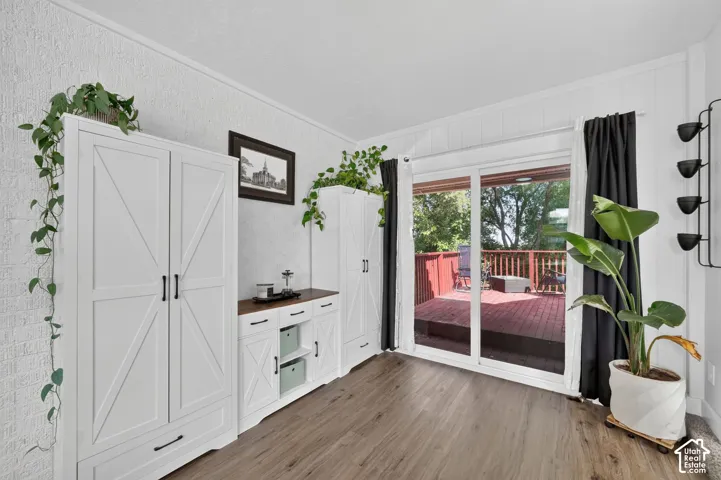 Dining area extends to outdoor deck.