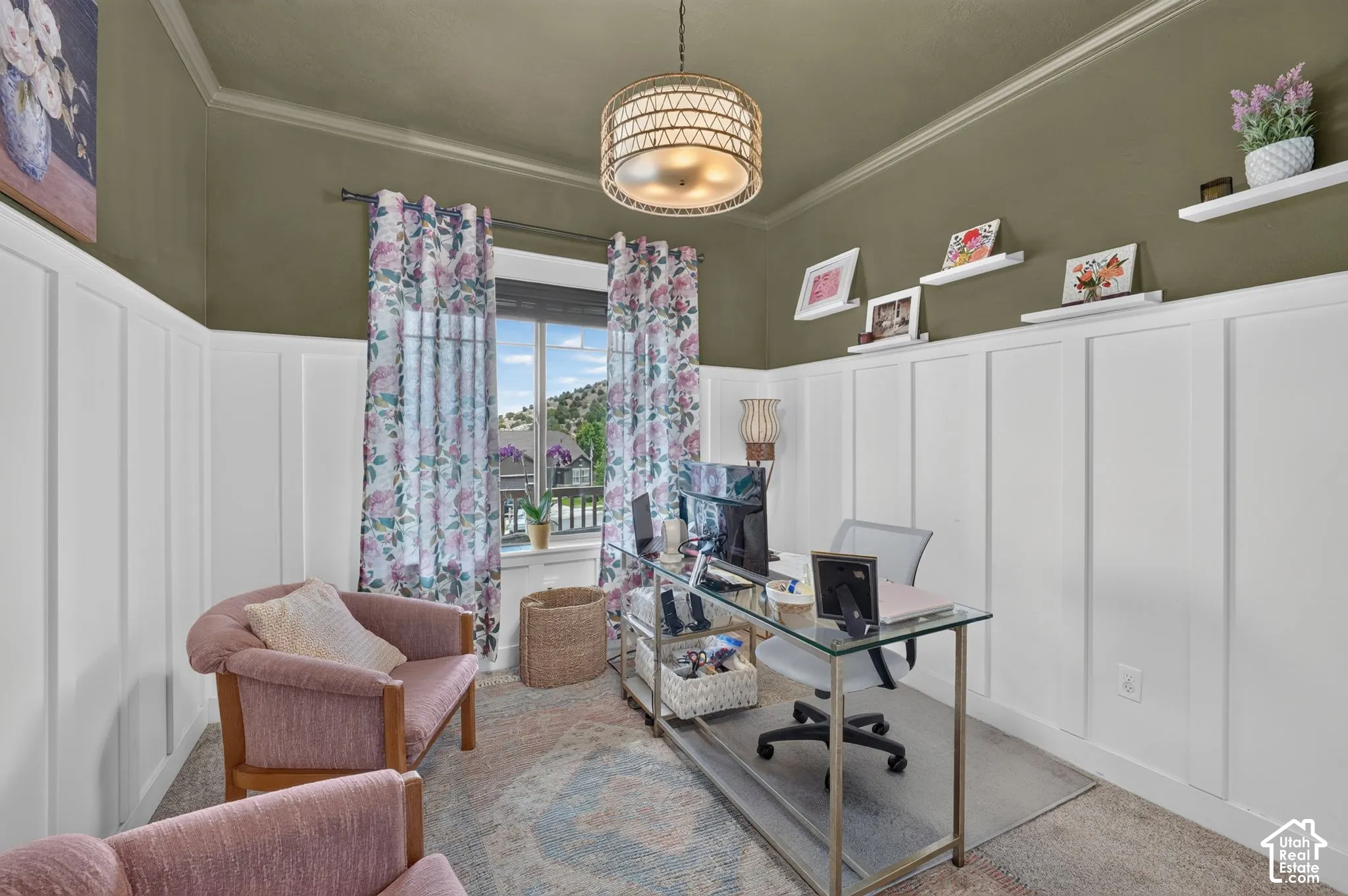 White wainscoting with a painted upper wall and crown molding
