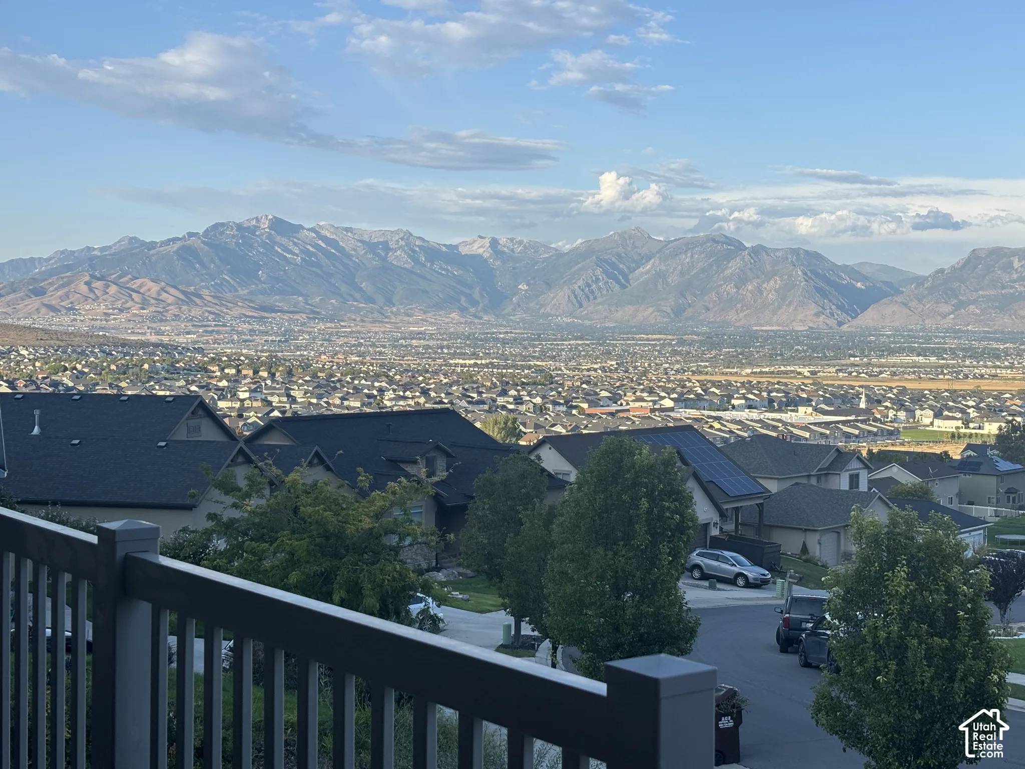 View from the front porch.  Mountain backdrop with a distant cityscape