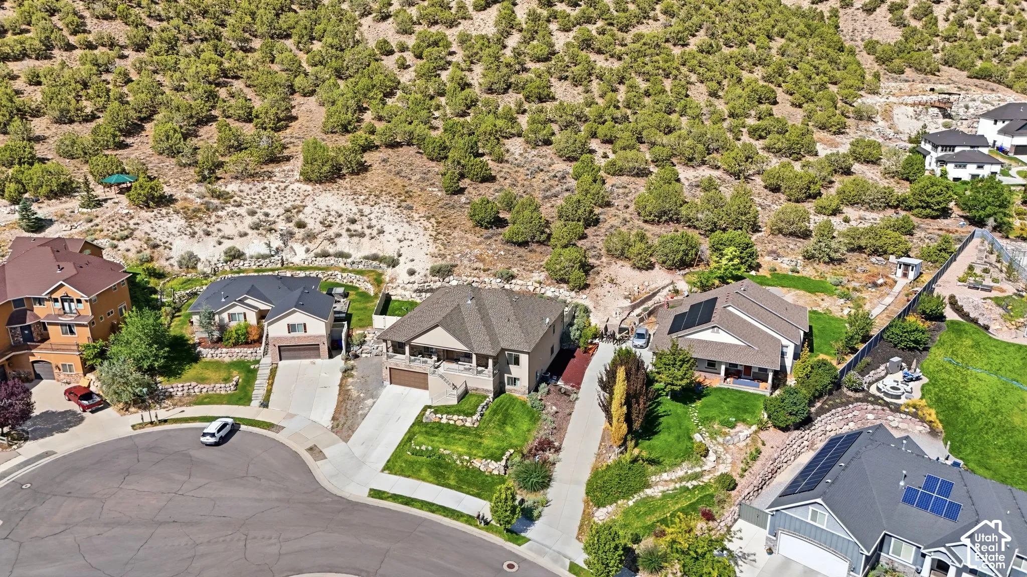 Community featuring paved streets and established residences with varying architectural styles