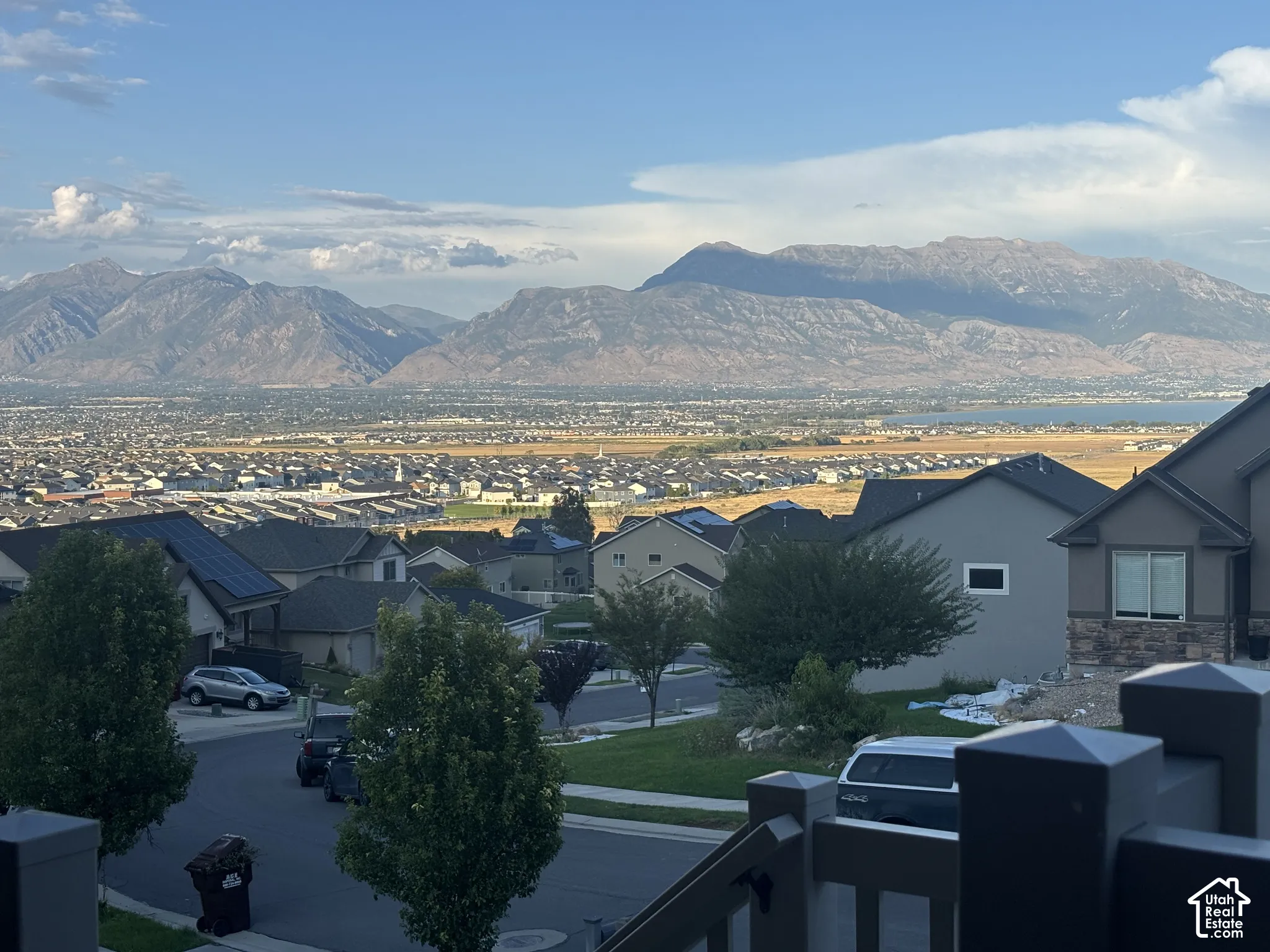 View from the front porch.  Expansive mountain backdrop with a distant body of water