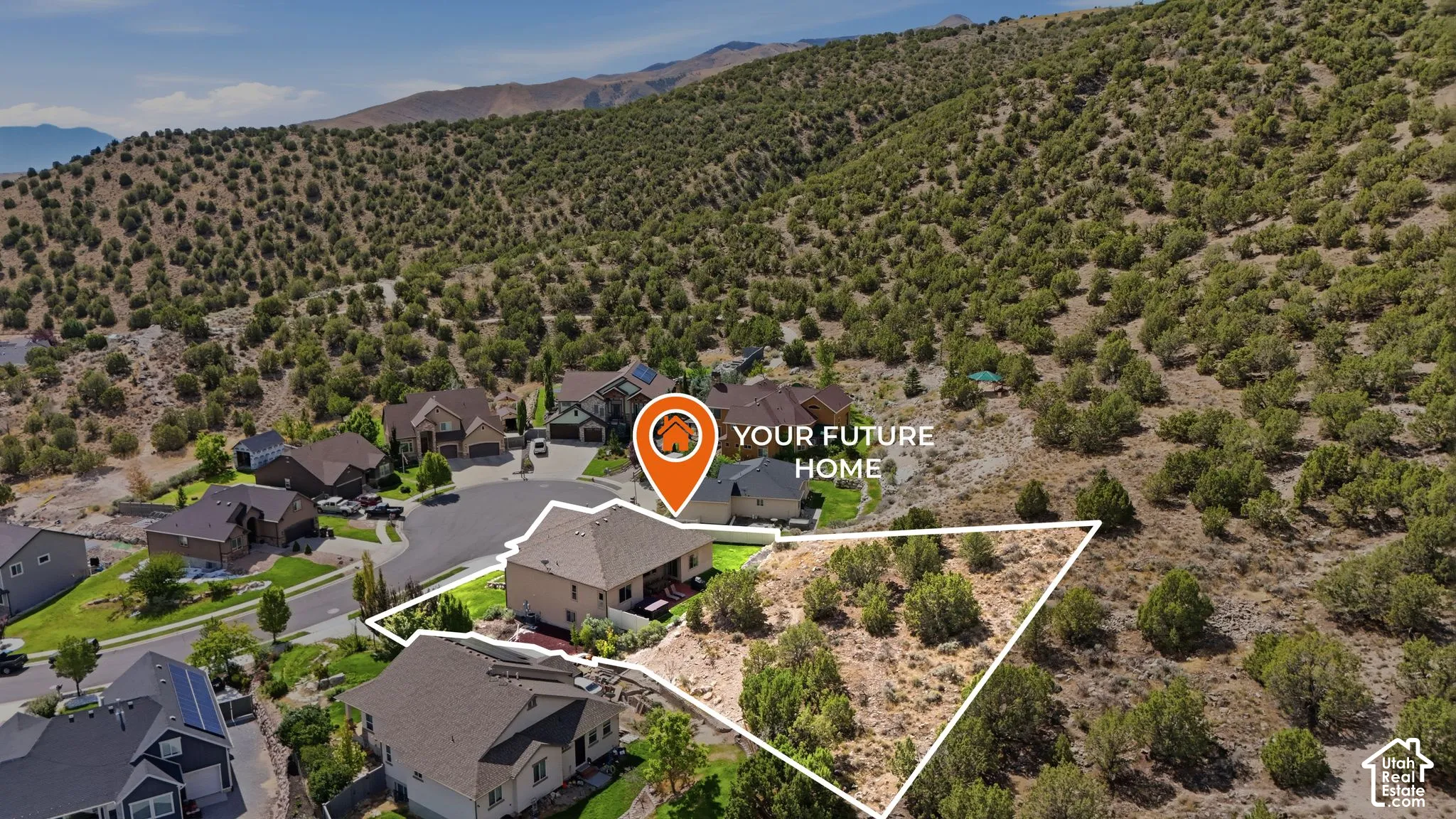 Expansive property featuring a single-family residence, an undeveloped parcel, and surrounding natural landscaping