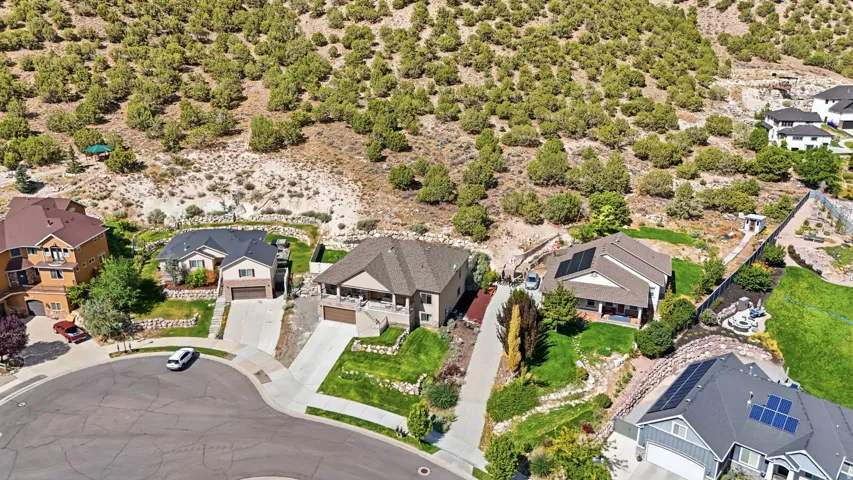 Community featuring paved streets and established residences with varying architectural styles