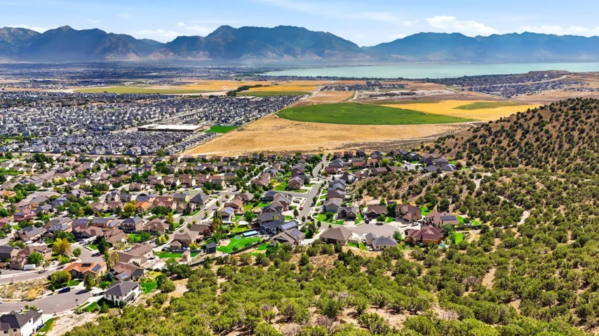 Residential neighborhood nestled on a hillside with natural landscaping