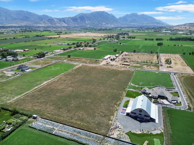 Expansive agricultural landscape with distant mountain ranges