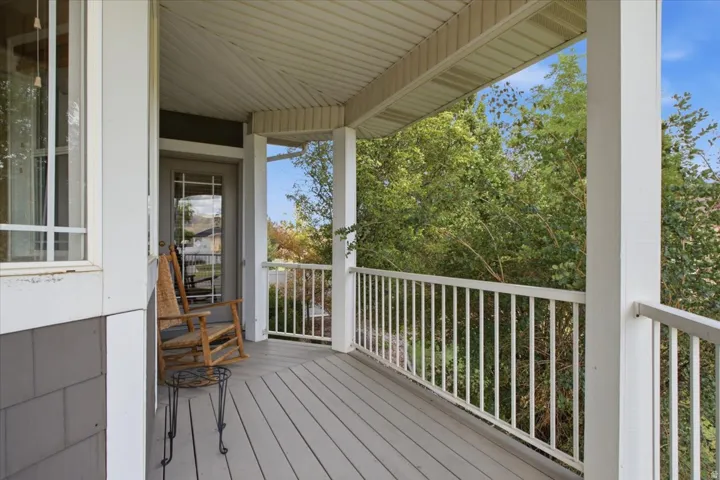 Side Porch with Beautiful Landscaping