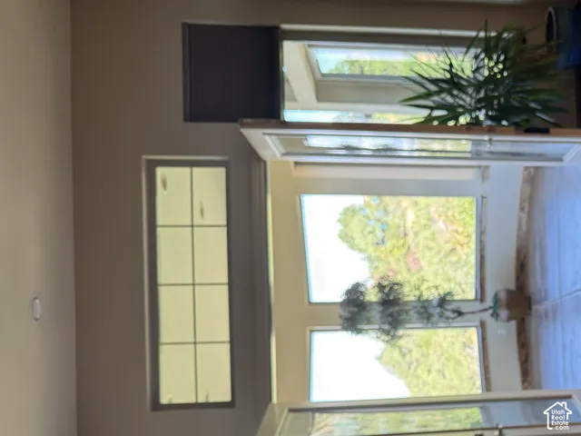 French doors opening to sun room