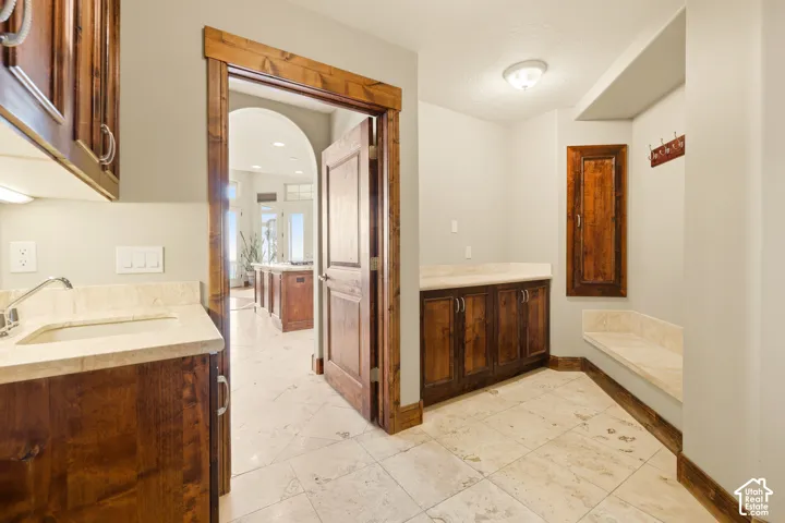 Spacious laundry and mud room entry from garage.