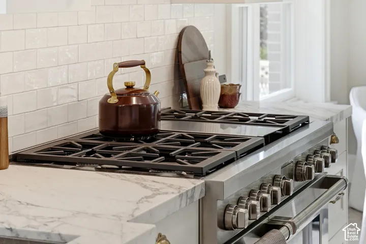A beautiful chef's kitchen with plenty of storage and function