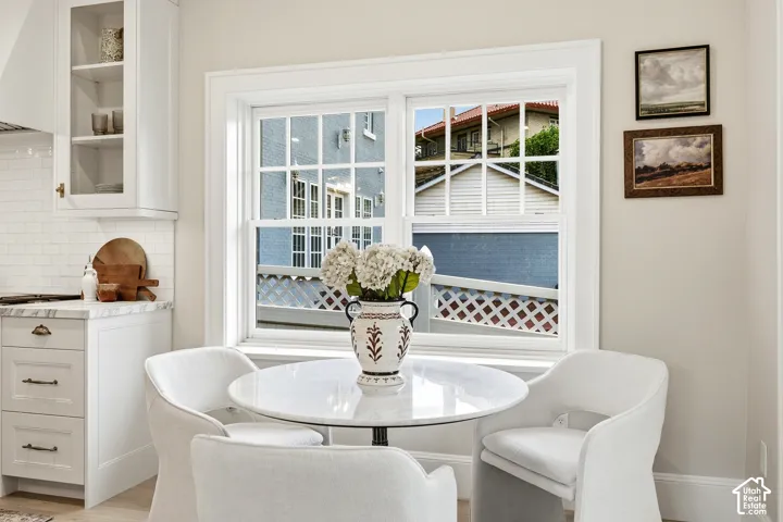 A breakfast nook in a sunny east corner of the kitchen