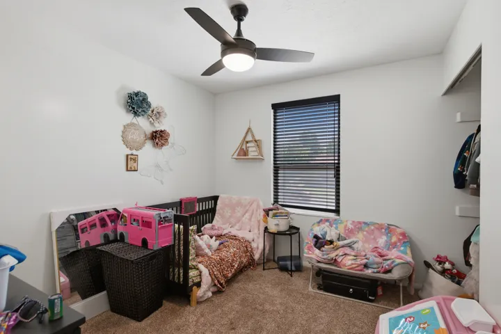 Integrated ceiling fan with light fixture, single window with blinds
