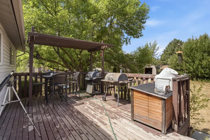 Wood deck with a built-in pergola