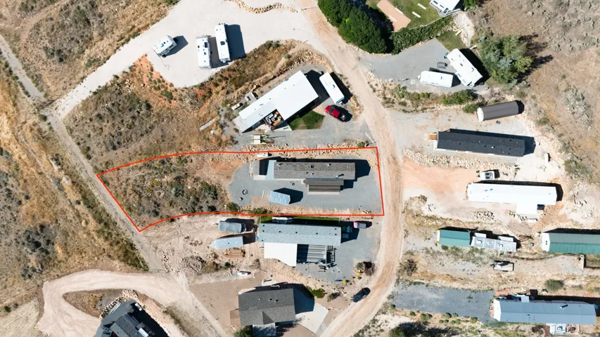 Large .28 acre lot with pull through access and room for your familys Rv's or travel trailers.