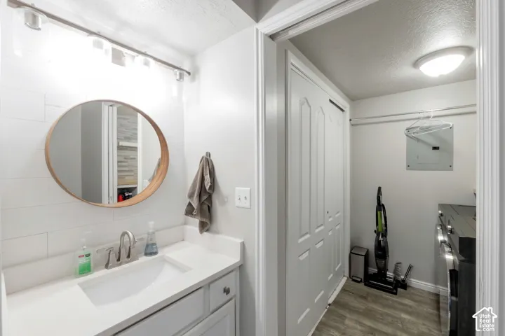 Main floor half bath connected to laundry area