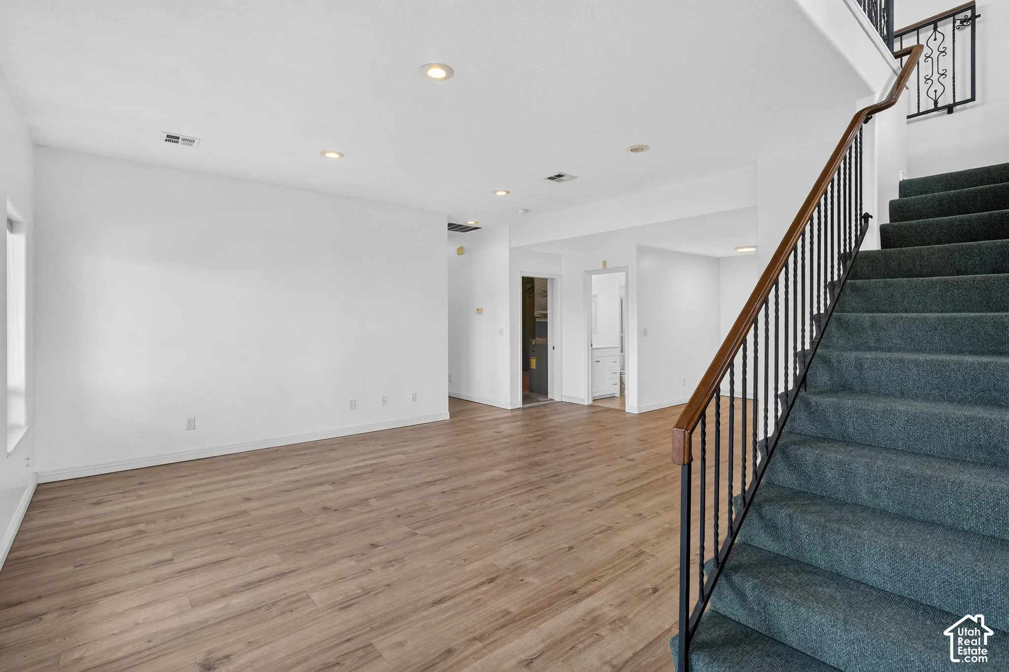 Wood-finish flooring throughout the main level