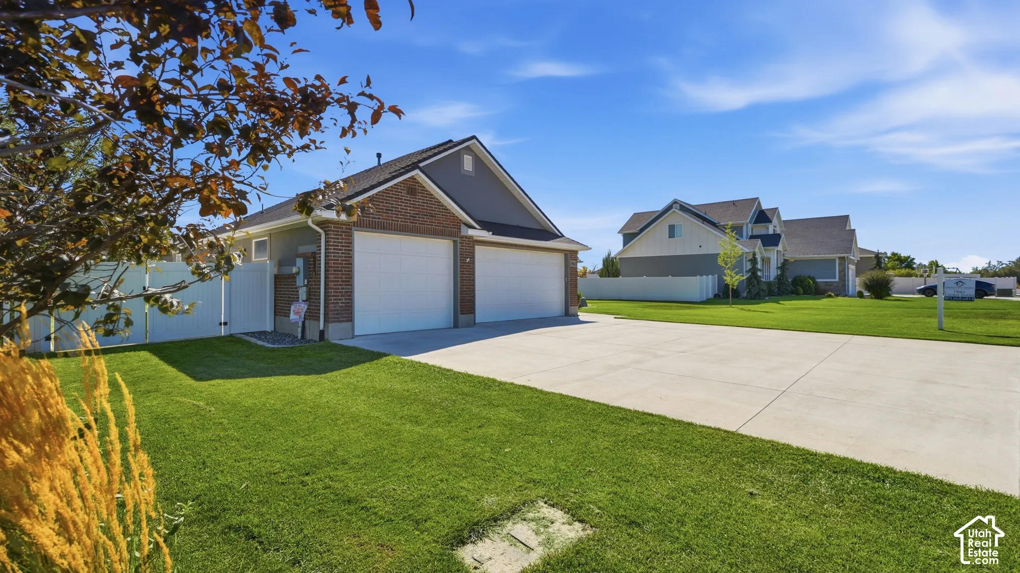 Brick and siding exterior with a two-car garage