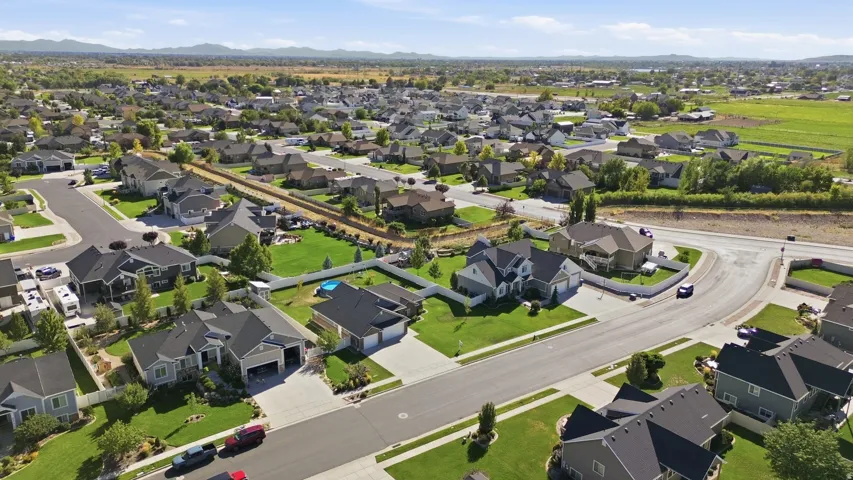 Residential neighborhood with established homes, paved streets, and green landscaping