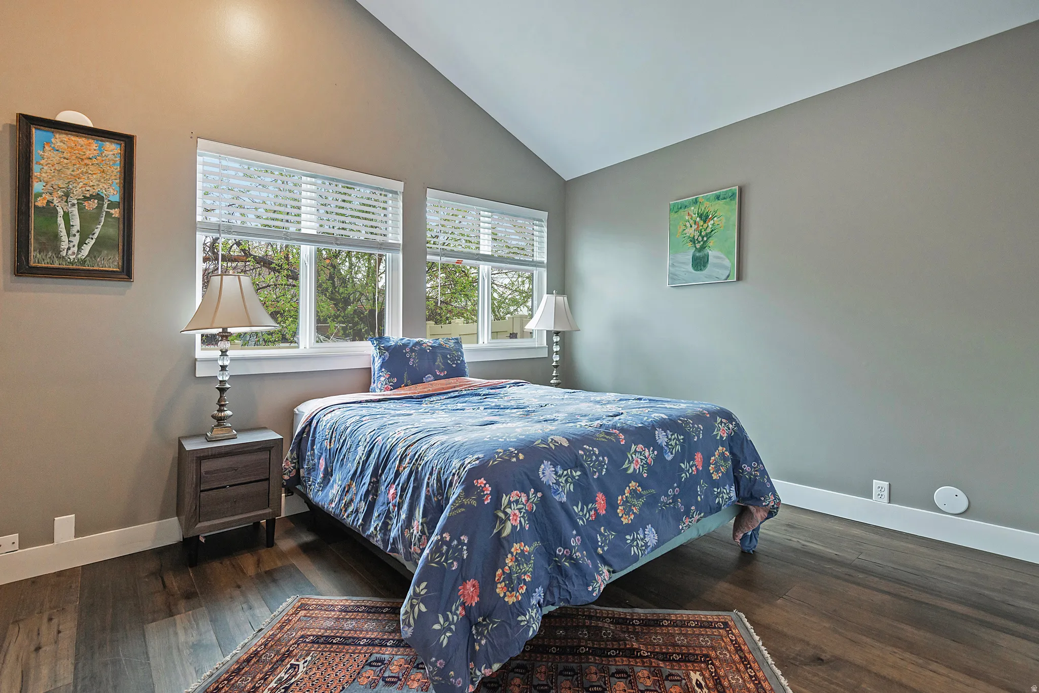 Vaulted ceiling with wood-finish flooring