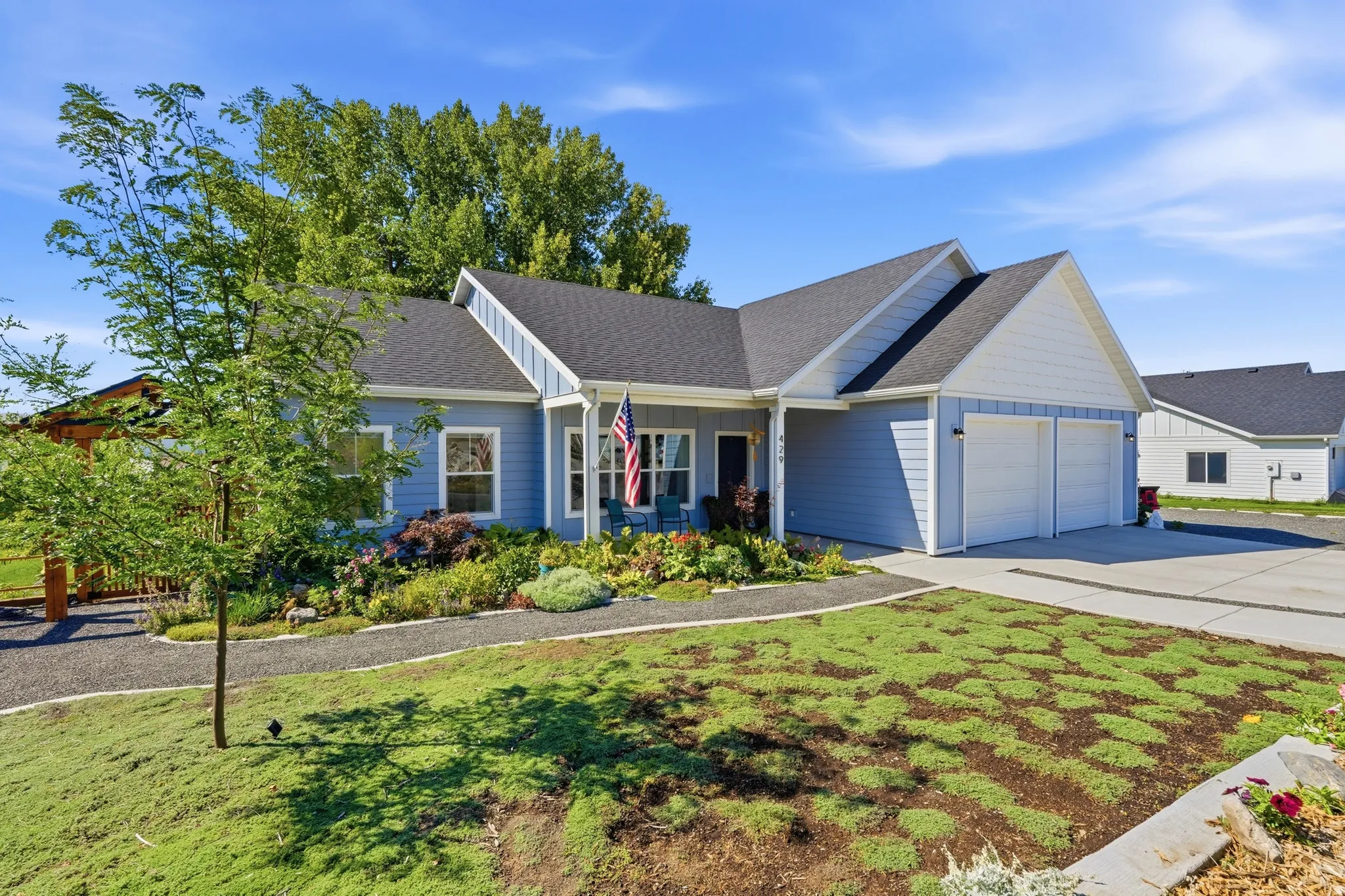 Light blue horizontal siding with white trim