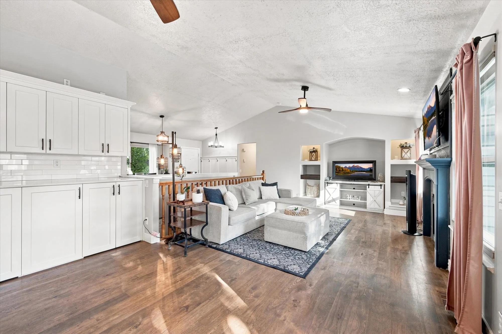 Vaulted ceilings and wood-finish flooring