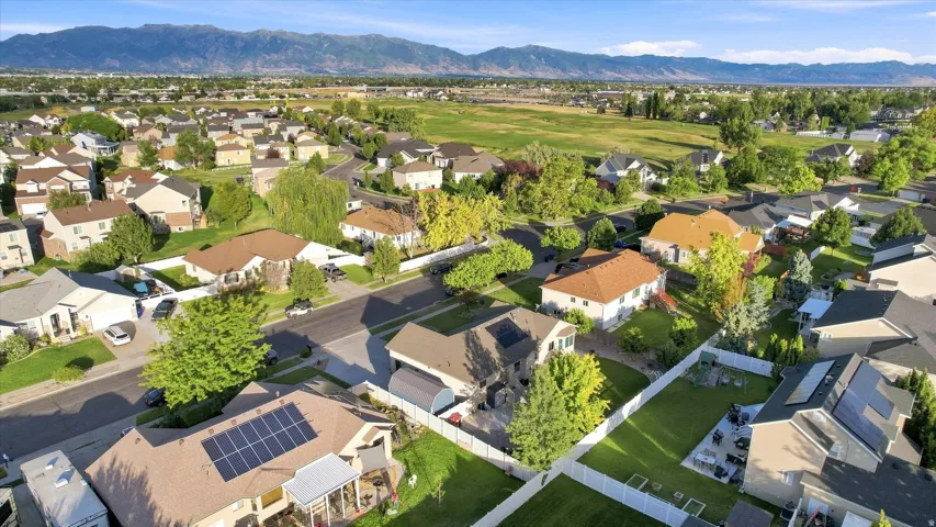 Residential neighborhood with mountain backdrop and green spaces
