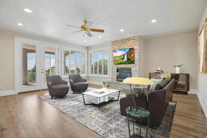 Wood-finish flooring, recessed lighting, and a ceiling fan