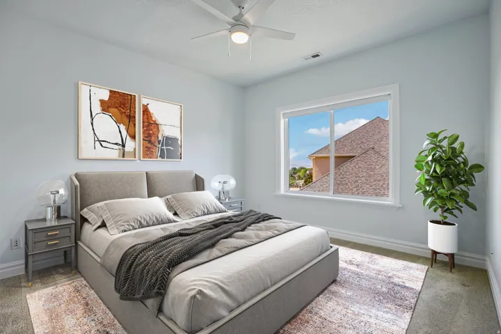 Recessed lighting, ceiling fan, large window, light-colored walls, and carpet flooring