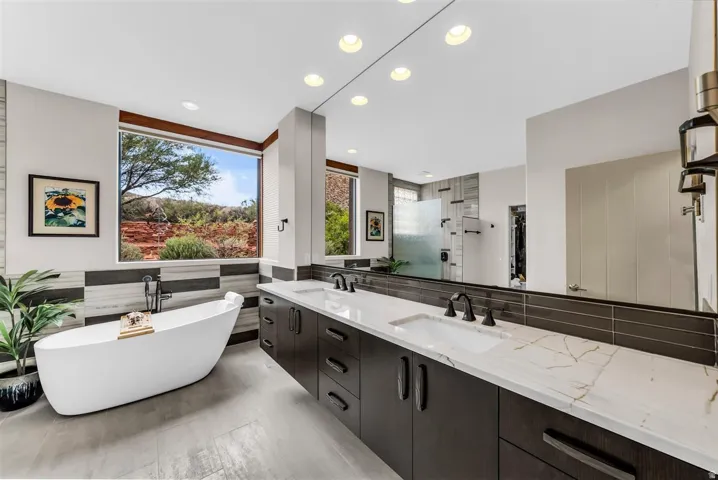Primary Bathroom with dual vanity and soaking tub