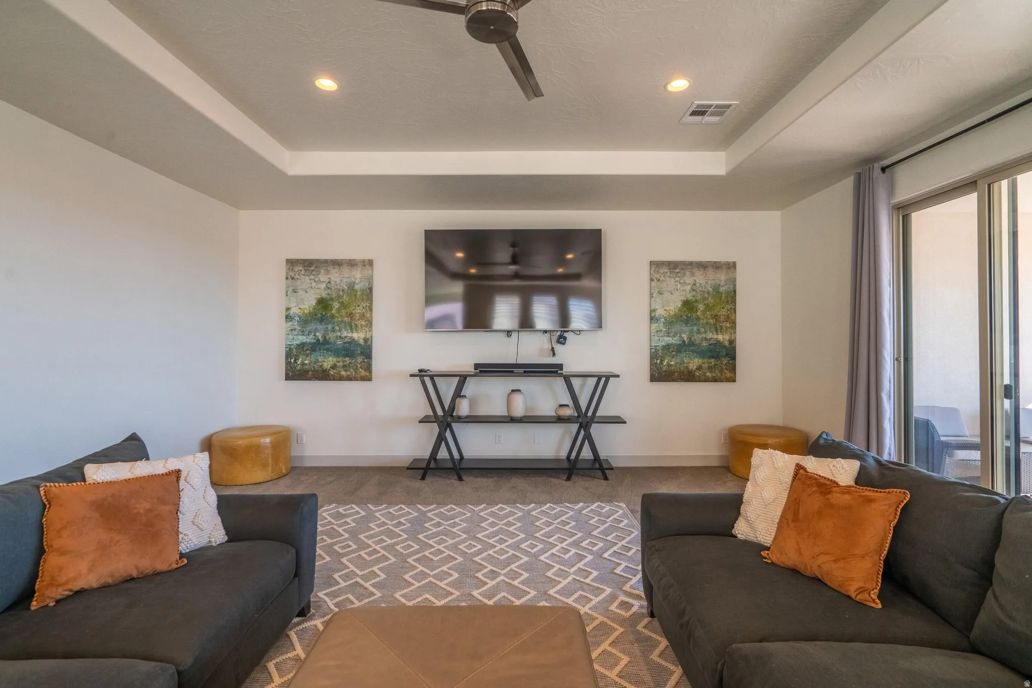 2nd Floor Family Room with recessed lighting, tray ceiling, two ceiling fans, sliding glass doors, and carpet flooring