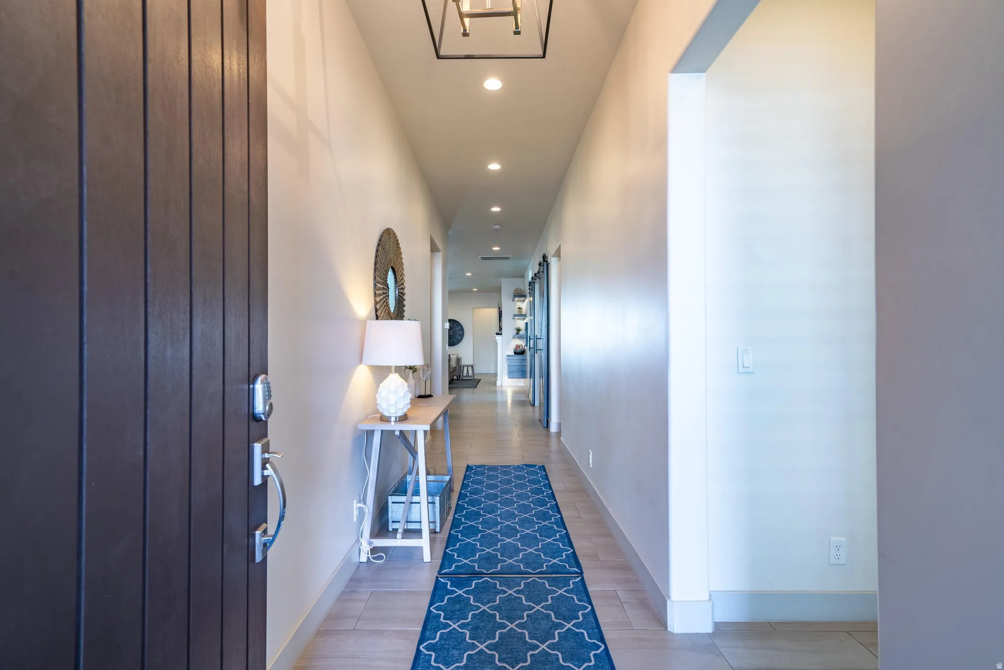 Entryway with recessed lighting and tile flooring