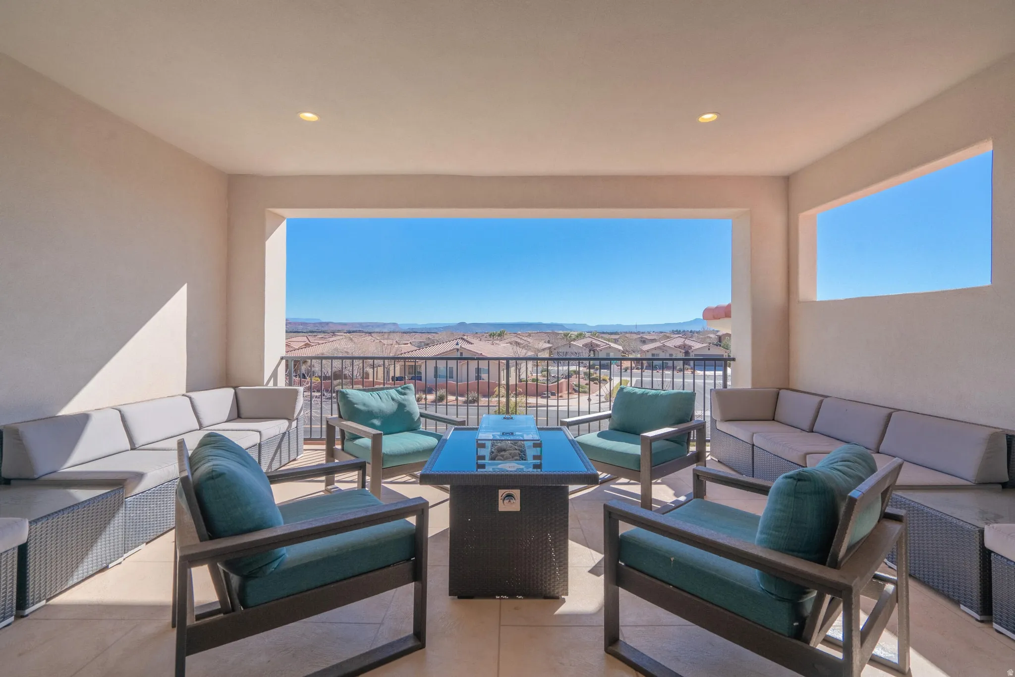 Expansive outdoor balcony with recessed lighting