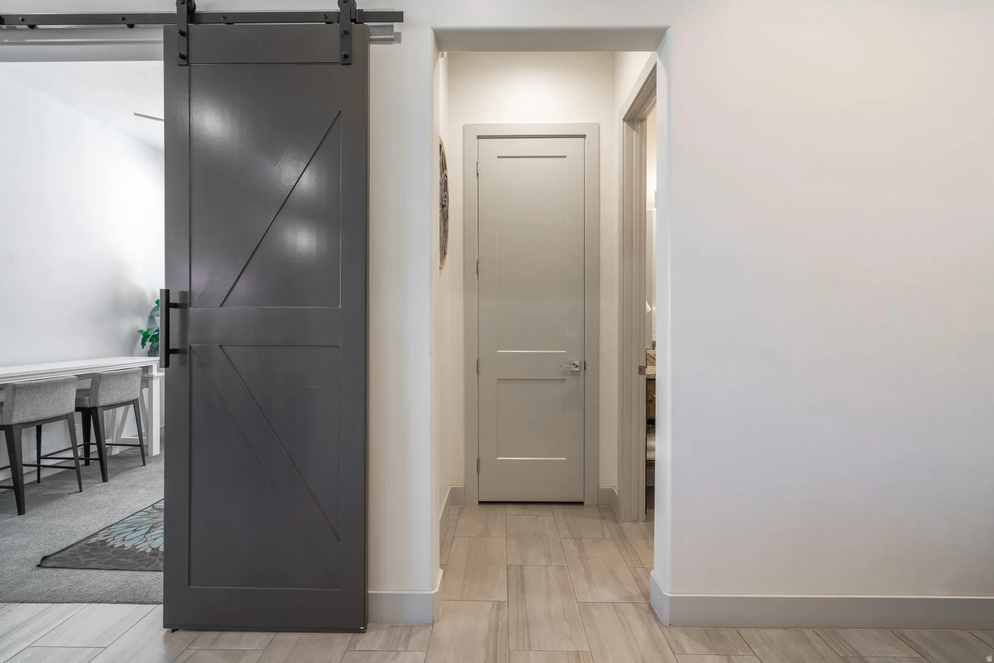 Hallway to Main Level Guest Bathroom and Mudroom Entrance to Garage