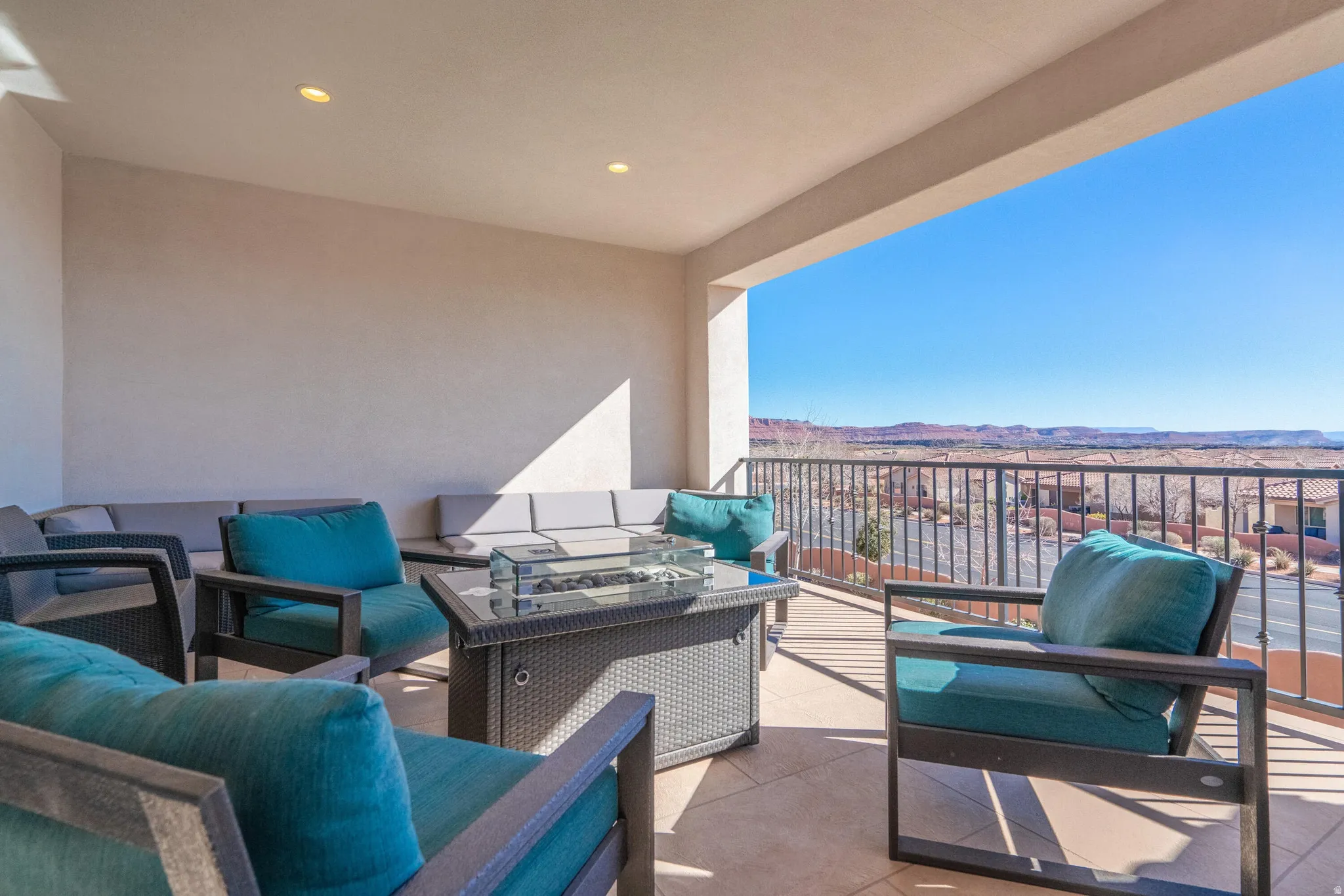 Expansive outdoor balcony with recessed lighting