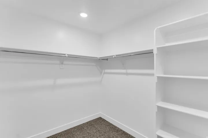 White walls with a recessed light fixture