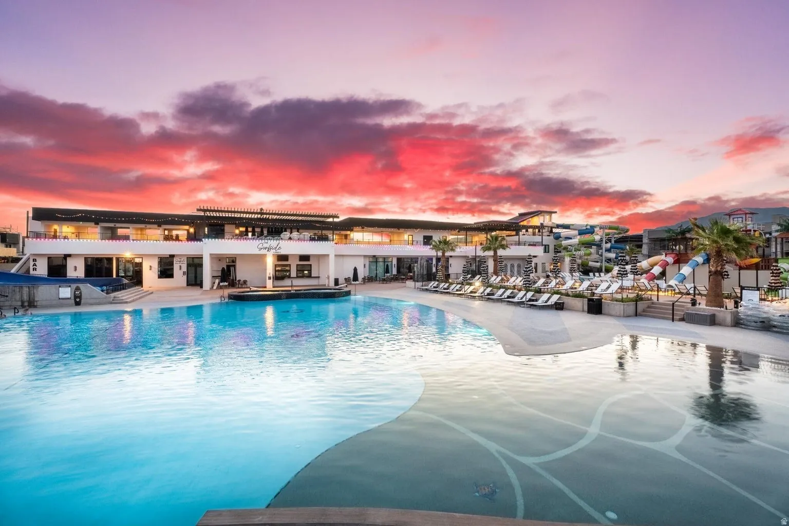 Expansive multi-level pool area with integrated water features