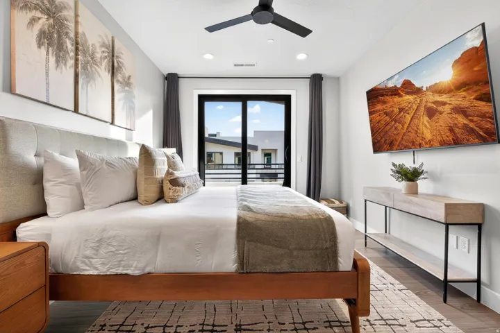 Hardwood flooring, recessed lighting, and ceiling fan