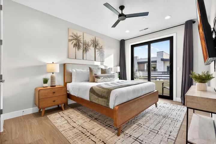 Wood-finish flooring, recessed lighting, and a ceiling fan