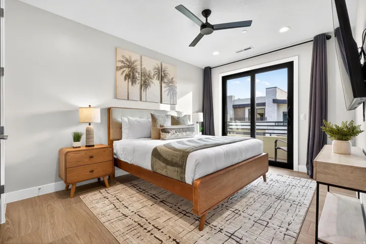 Wood-finish flooring, recessed lighting, and a ceiling fan