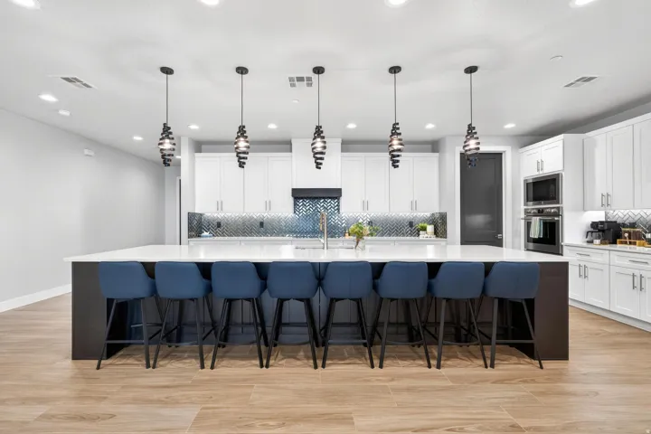 Expansive kitchen island with a light-toned countertop