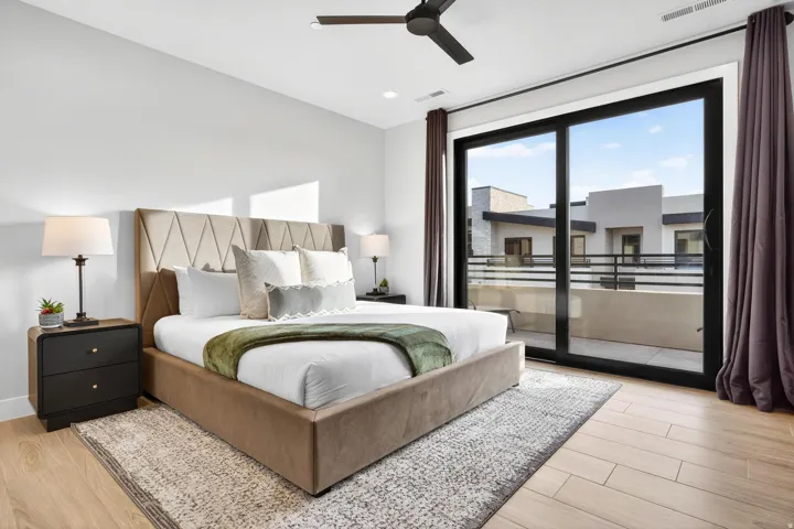 Wood-finish flooring with a modern ceiling fan