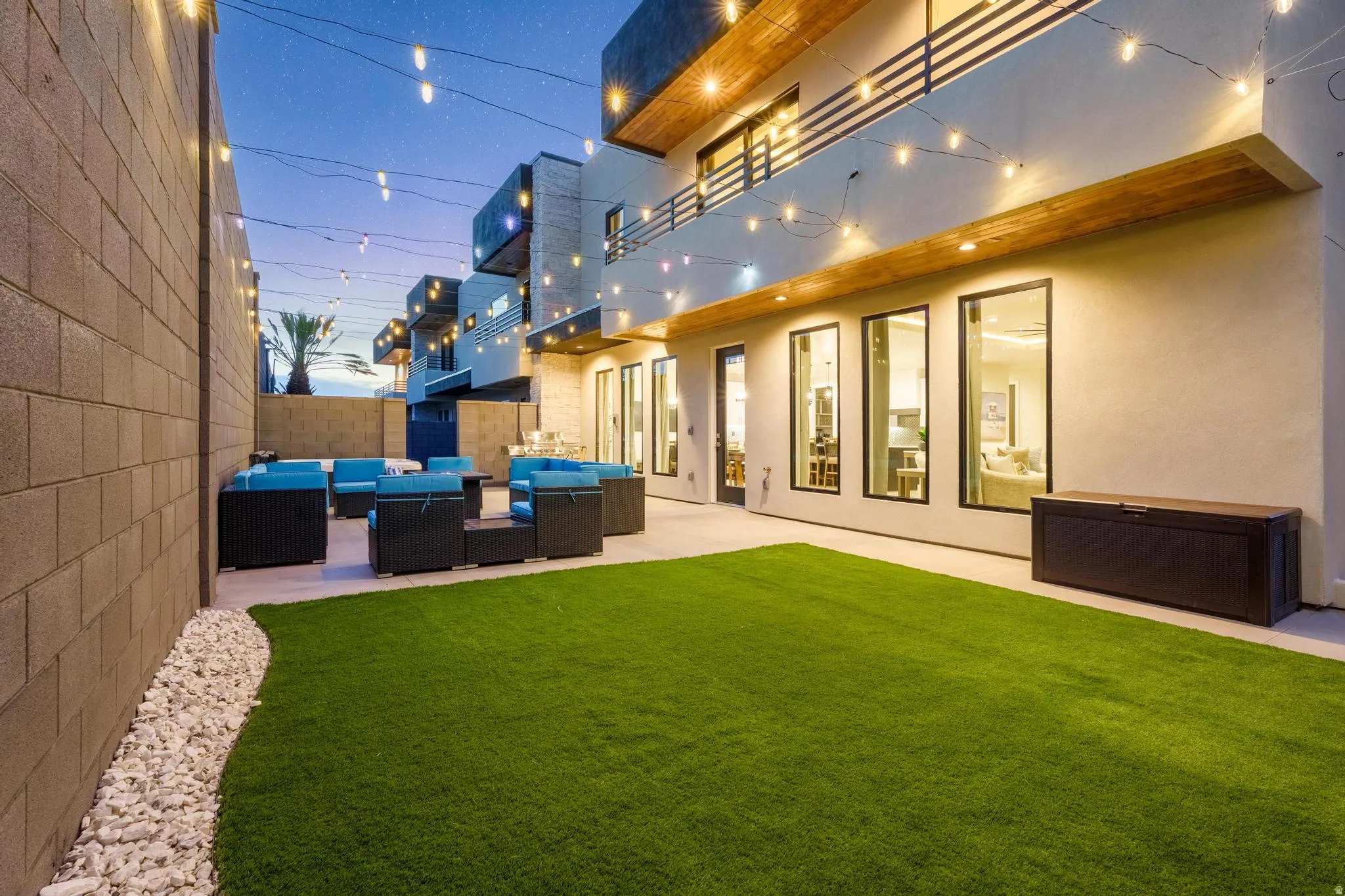 Artificial turf lawn with a concrete patio