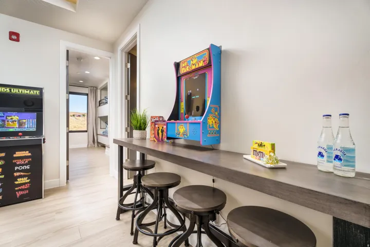 Wood-finish flooring with white walls and trim