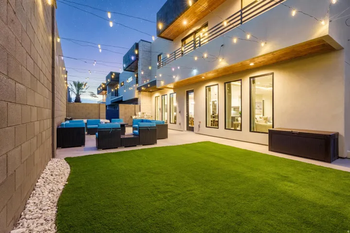 Artificial turf lawn with a concrete patio