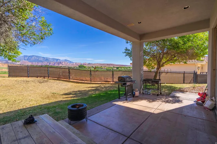 Covered patio with recessed lighting and concrete flooring