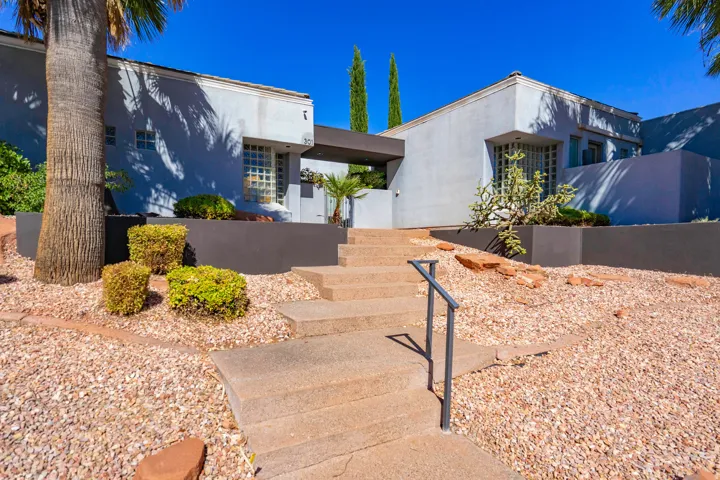Modern exterior architecture with a flat roofline and light-colored stucco finish