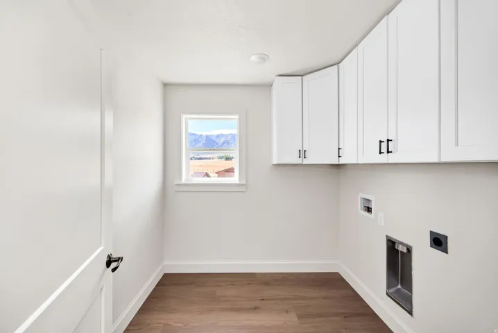 White shaker-style cabinetry with black hardware