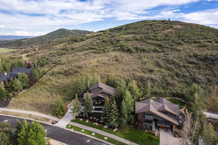 Mountainous backdrop with substantial natural landscaping