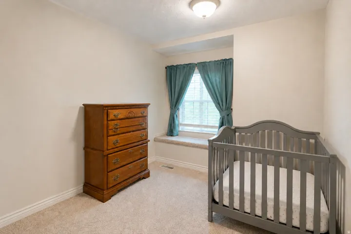 Recessed window with a built-in window seat, carpeted flooring, and a flush mount ceiling light