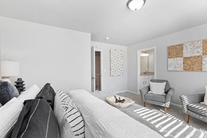 Recessed lighting, light gray carpet, and white painted walls