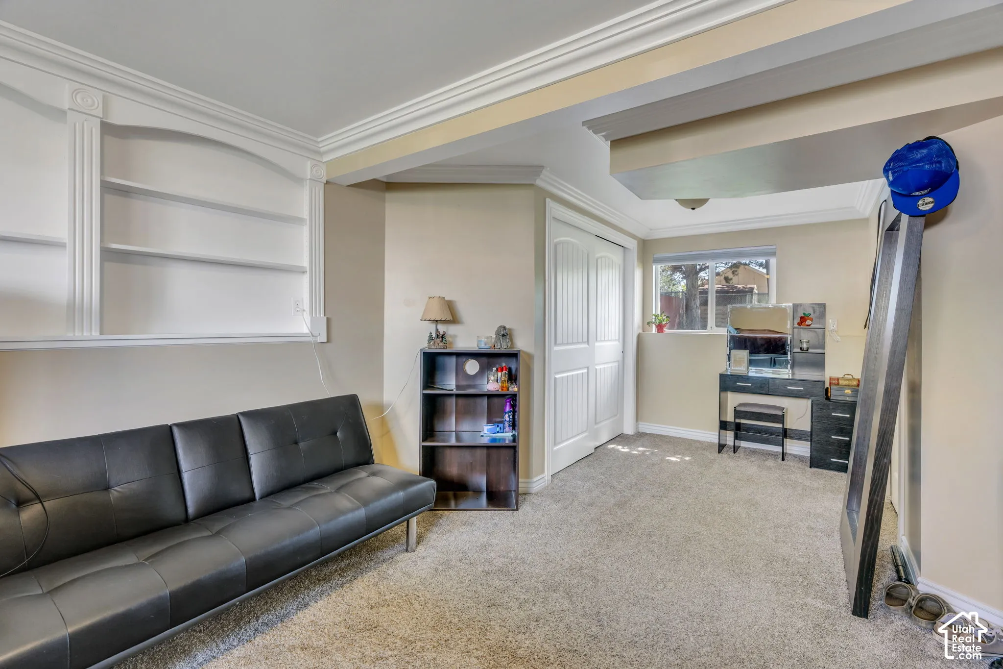 Spacious downstairs bedroom features a versatile nook—perfect for a home office, desk, reading area or extra storage.